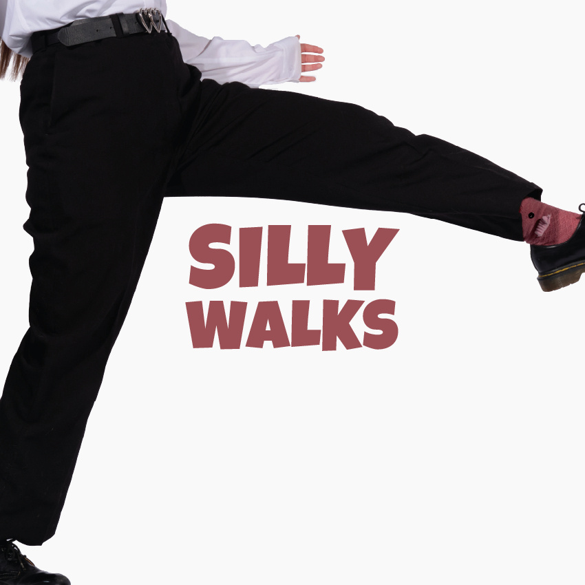 Red text "Silly Walks" with a person stepping over the text